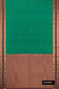 Green Dual Tone Kanchipuram Silk Saree with Stripes on the body and Zari Border.  displayed on a mannequin