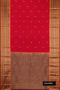 Brick Orange Dual Tone Kanchipuram Silk Saree with Zari Butta on the body and Zari Border.  displayed on a mannequin
