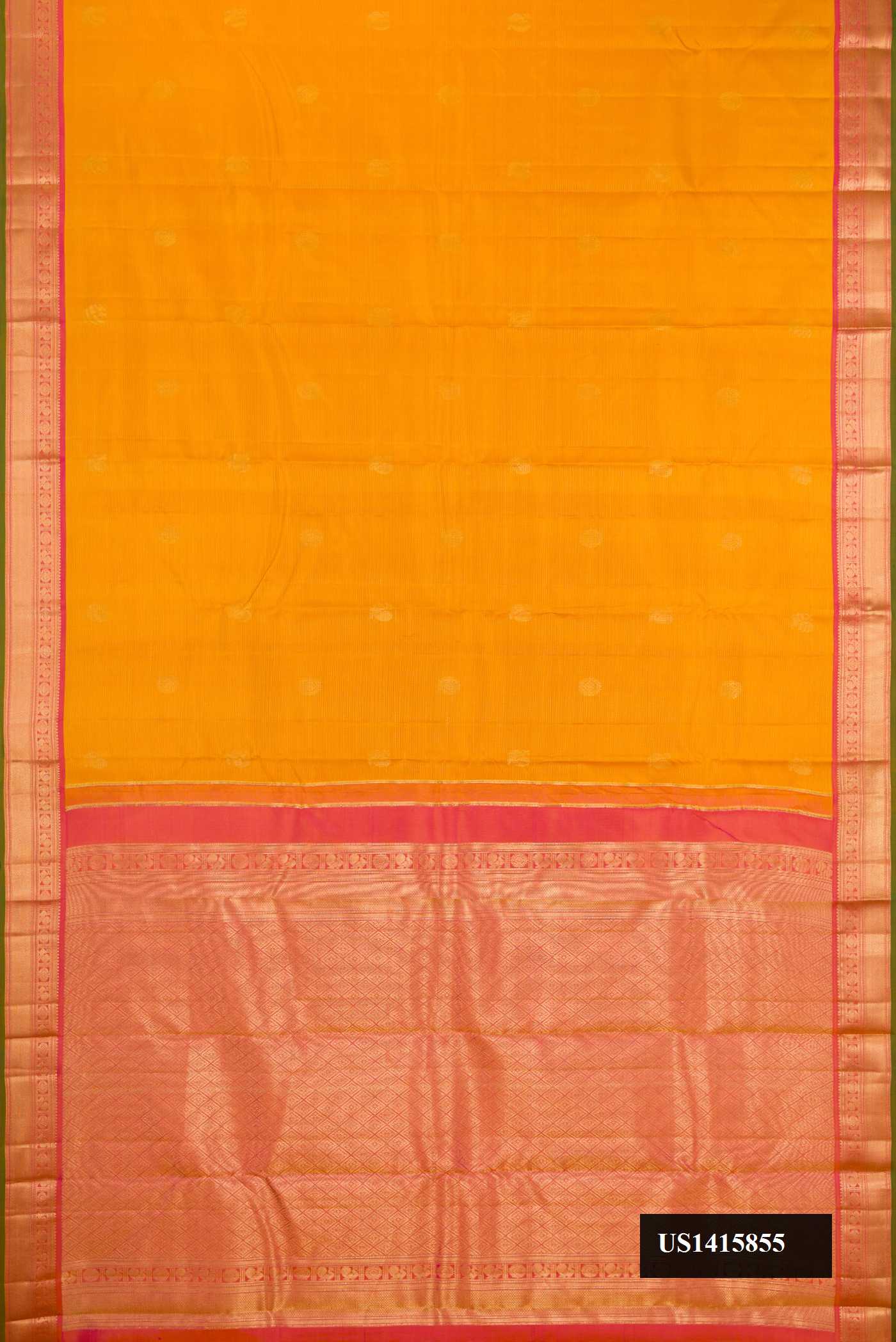 Mustard Dual Tone Kanchipuram Silk Saree with Zari Butta on the body and Zari Border.  displayed on a mannequin