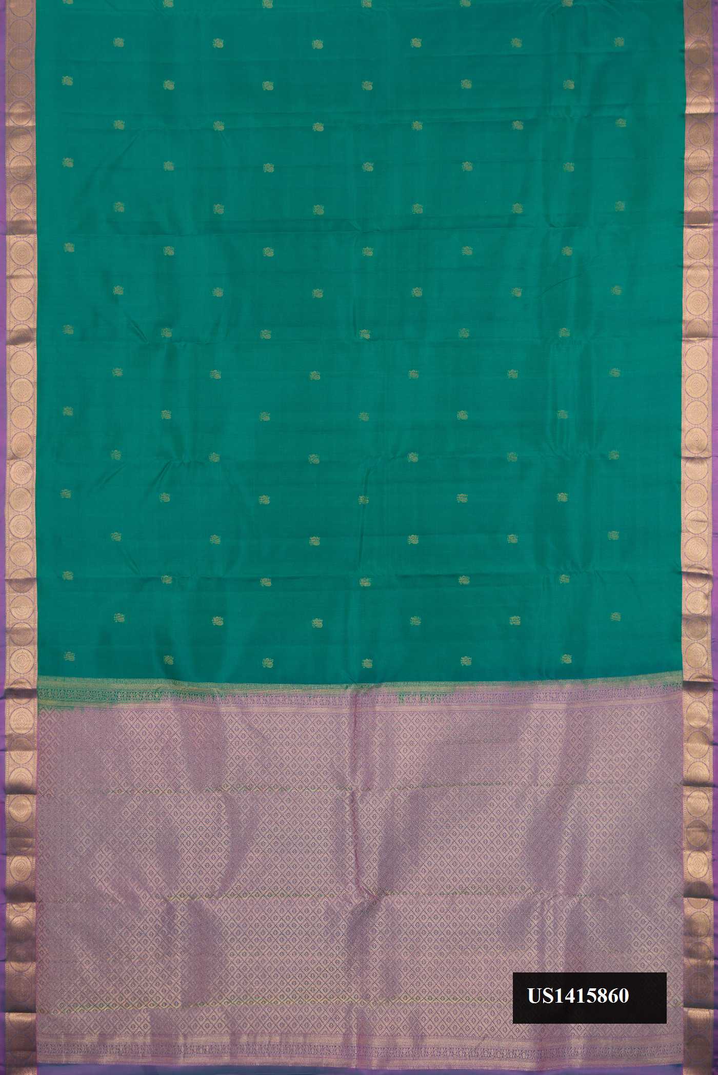 Green Dual Tone Kanchipuram Silk Saree with Zari Butta on the body and Zari Border.  displayed on a mannequin