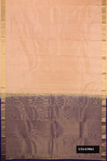 Rose Gold Dual Tone Kanchipuram Silk Saree with Zari Butta on the body and Zari Border.  displayed on a mannequin