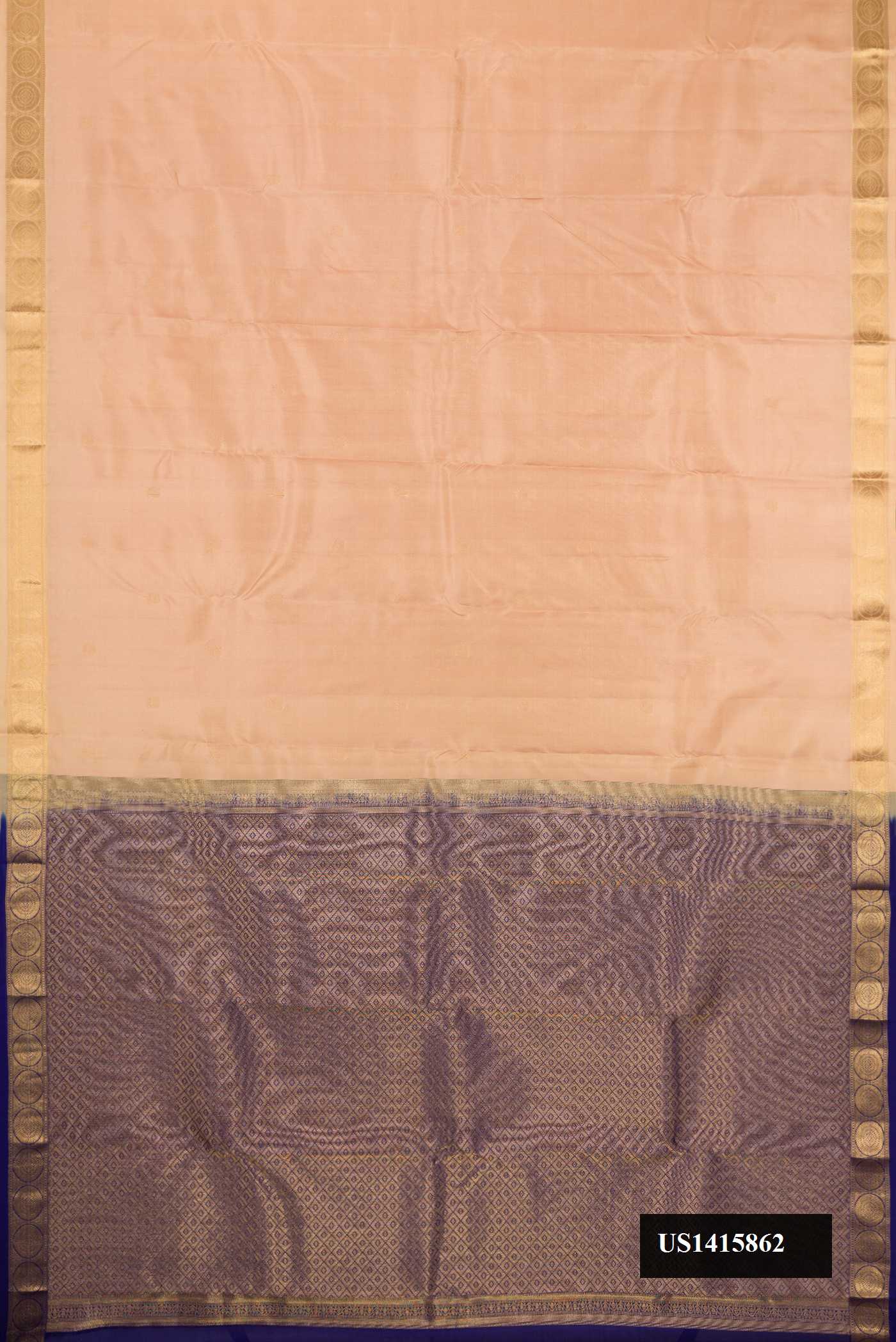 Rose Gold Dual Tone Kanchipuram Silk Saree with Zari Butta on the body and Zari Border.  displayed on a mannequin