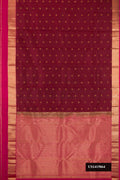 Maroon Dual Tone Kanchipuram Silk Saree with Zari Butta on the body and Zari Border.  displayed on a mannequin