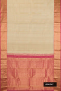 Dark Beige Dual Tone Kanchipuram Silk Saree with Zari Butta on the body and Zari Border.  displayed on a mannequin