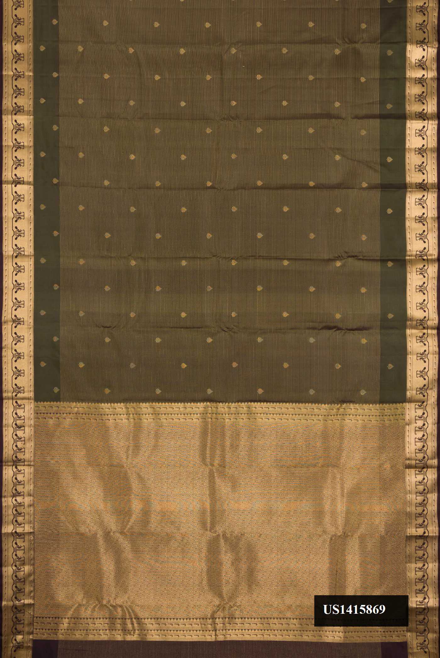 Bottle Green Dual Tone Kanchipuram Silk Saree with Zari Butta on the body and Fancy Border.  displayed on a mannequin