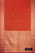 Brick Orange Dual Tone Kanchipuram Silk Saree with Zari Butta on the body and Zari Border.  displayed on a mannequin
