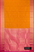 Mustard Dual Tone Kanchipuram Silk Saree with Zari Butta on the body and Zari Border.  displayed on a mannequin