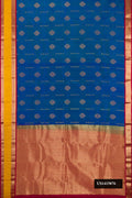 Peacock Blue Dual Tone Kanchipuram Silk Saree with Zari Butta on the body and Zari Border.  displayed on a mannequin