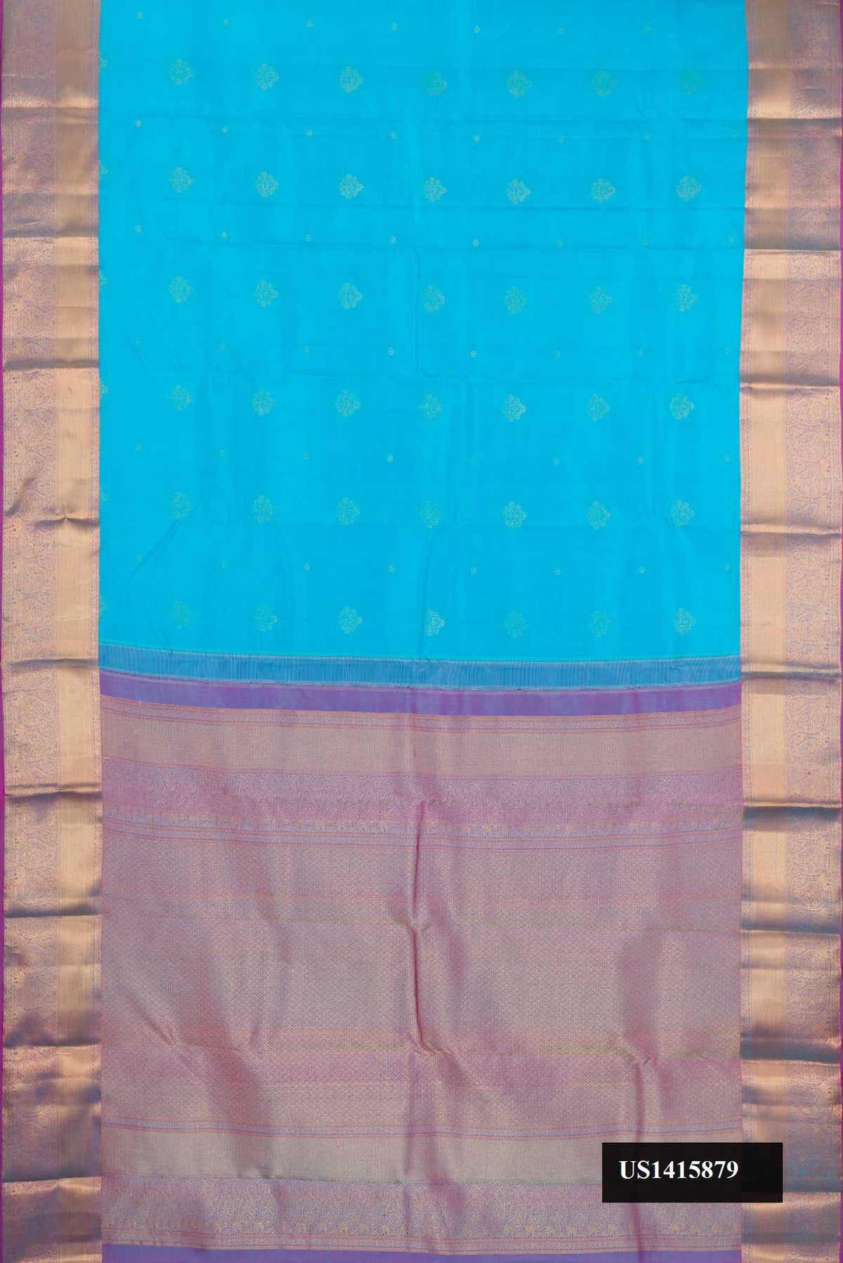 Sky Blue Dual Tone Kanchipuram Silk Saree with Zari Butta on the body and Zari Border.  displayed on a mannequin