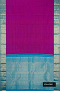 Purple Dual Tone Kanchipuram Silk Saree with Stripes on the body and Zari Border.  displayed on a mannequin