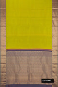 Parrot Green Dual Tone Kanchipuram Silk Saree with Stripes on the body and Zari Border.  displayed on a mannequin