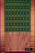 Bottle Green Dual Tone Kanchipuram Silk Saree with Checked design on the body and Zari Border.  displayed on a mannequin
