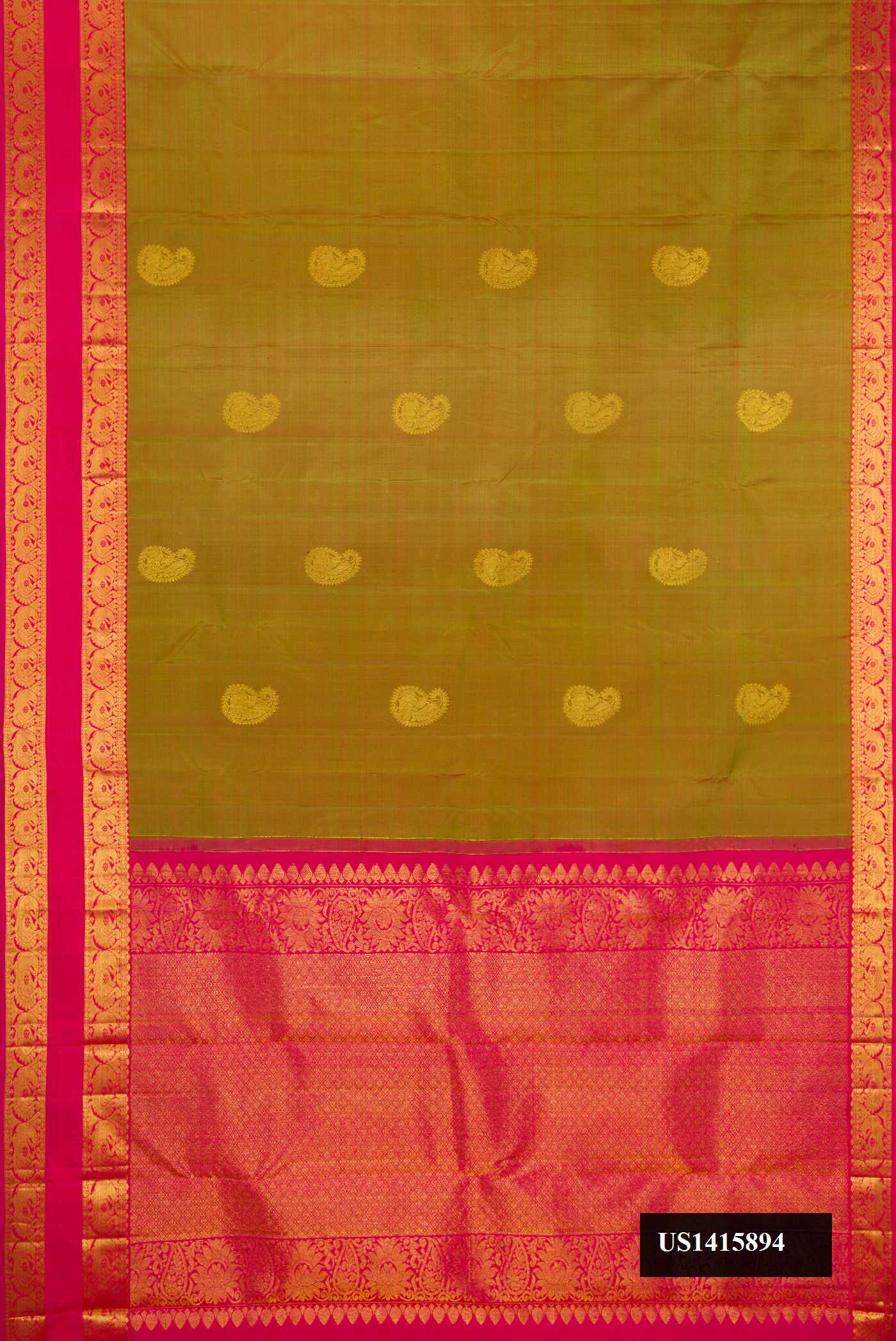 Green Dual Tone Kanchipuram Silk Saree with Zari Butta on the body and Zari Border.  displayed on a mannequin