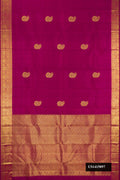 Magenta Dual Tone Kanchipuram Silk Saree with Zari Butta on the body and Zari Border.  displayed on a mannequin