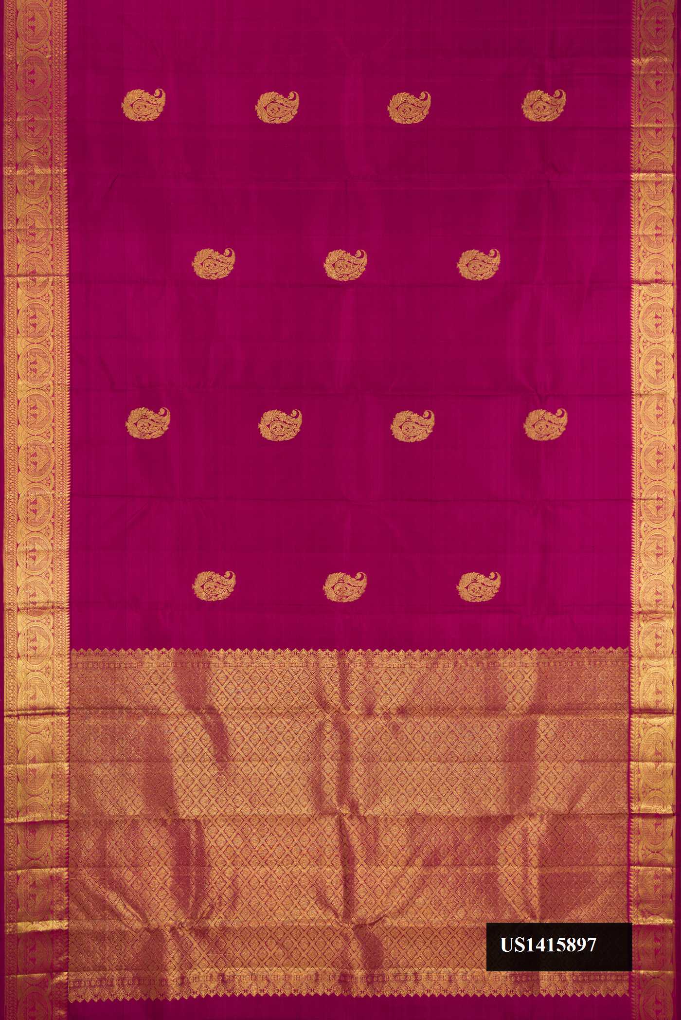 Magenta Dual Tone Kanchipuram Silk Saree with Zari Butta on the body and Zari Border.  displayed on a mannequin