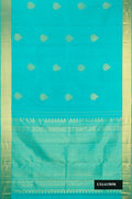Sky Blue Dual Tone Kanchipuram Silk Saree with Zari Butta on the body and Zari Border.  displayed on a mannequin
