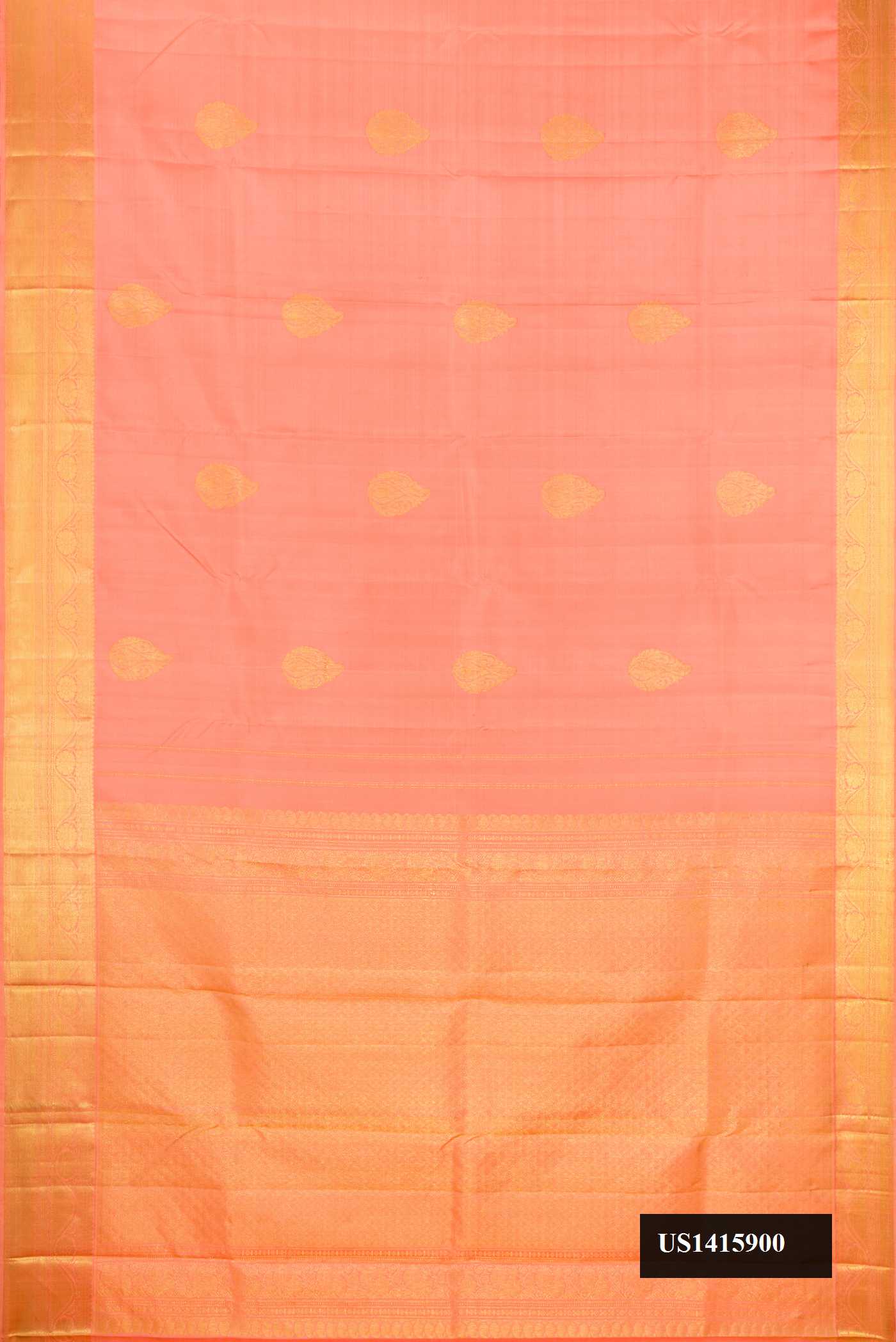 Peach Dual Tone Kanchipuram Silk Saree with Zari Butta on the body and Zari Border.  displayed on a mannequin