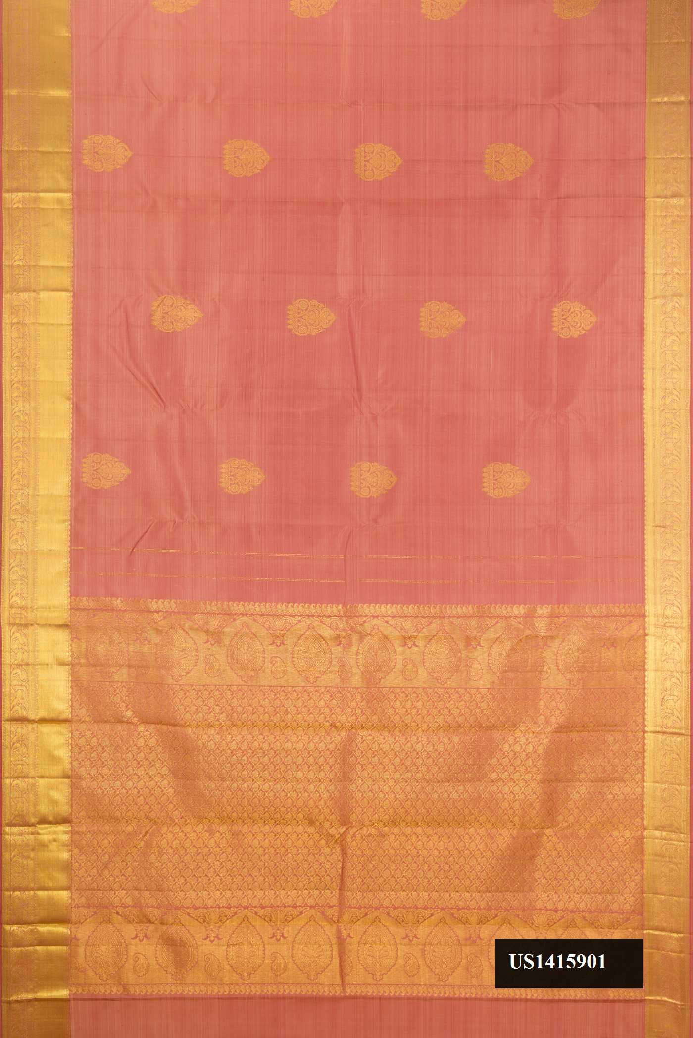 Rose Gold Dual Tone Kanchipuram Silk Saree with Zari Butta on the body and Zari Border.  displayed on a mannequin