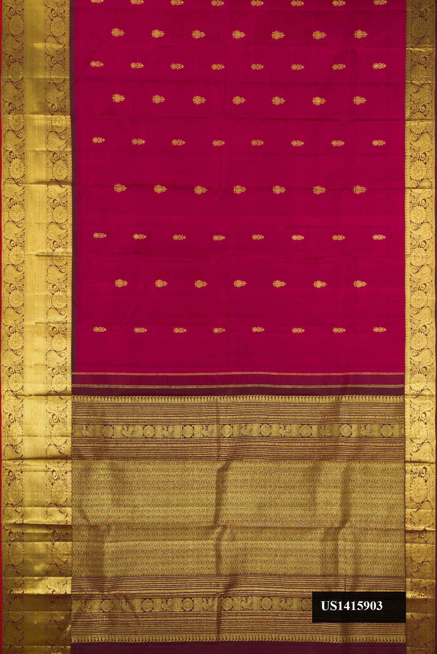 Maroon Dual Tone Kanchipuram Silk Saree with Zari Butta on the body and Zari Border.  displayed on a mannequin
