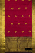 Dark Mauve Dual Tone Kanchipuram Silk Saree with Zari Butta on the body and Zari Border.  displayed on a mannequin