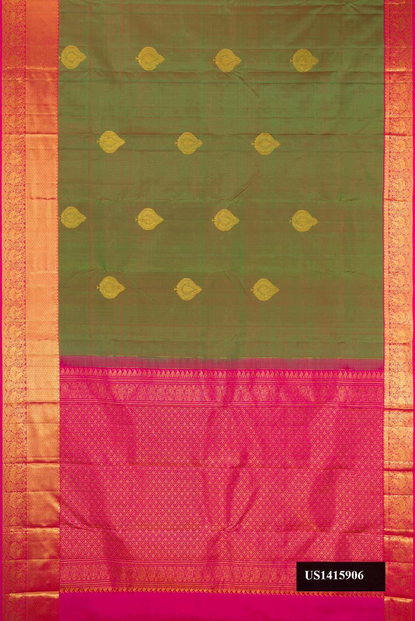 Green Dual Tone Kanchipuram Silk Saree with Zari Butta on the body and Zari Border.  displayed on a mannequin