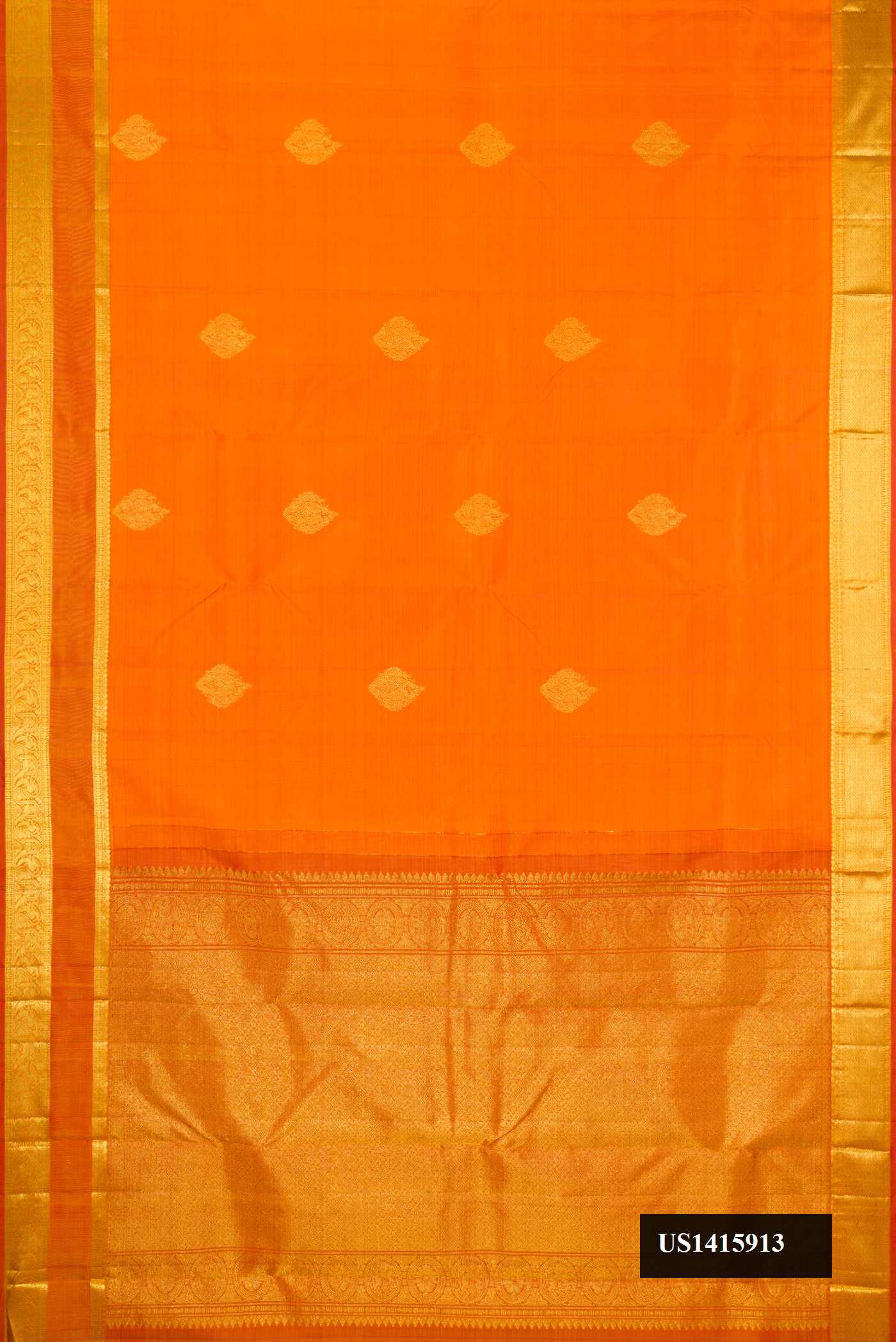 Orange Dual Tone Kanchipuram Silk Saree with Zari Butta on the body and Zari Border.  displayed on a mannequin