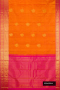 Mustard Dual Tone Kanchipuram Silk Saree with Zari Butta on the body and Zari Border.  displayed on a mannequin