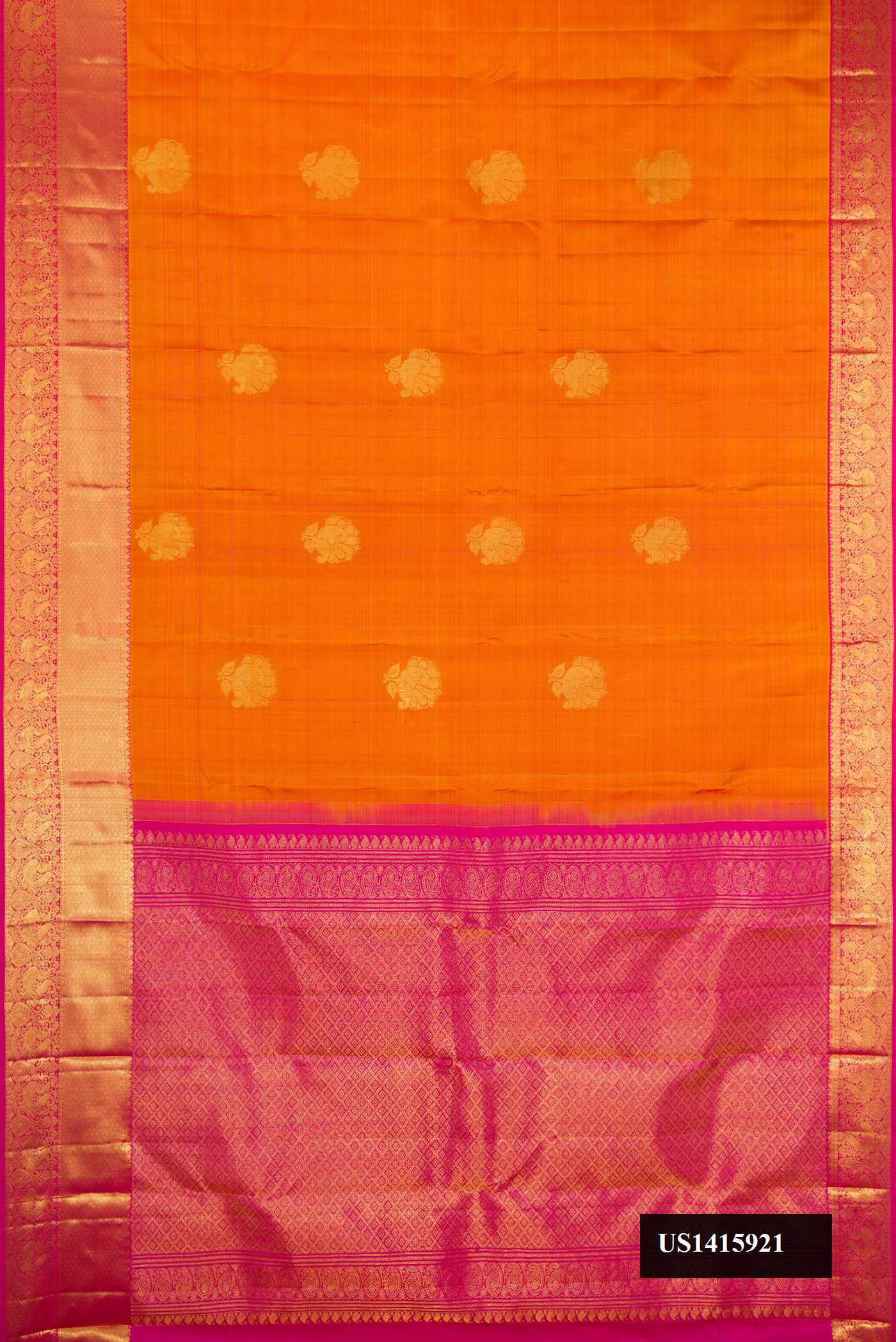 Mustard Dual Tone Kanchipuram Silk Saree with Zari Butta on the body and Zari Border.  displayed on a mannequin