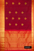 Maroon Dual Tone Kanchipuram Silk Saree with Zari Butta on the body and Zari Border.  displayed on a mannequin