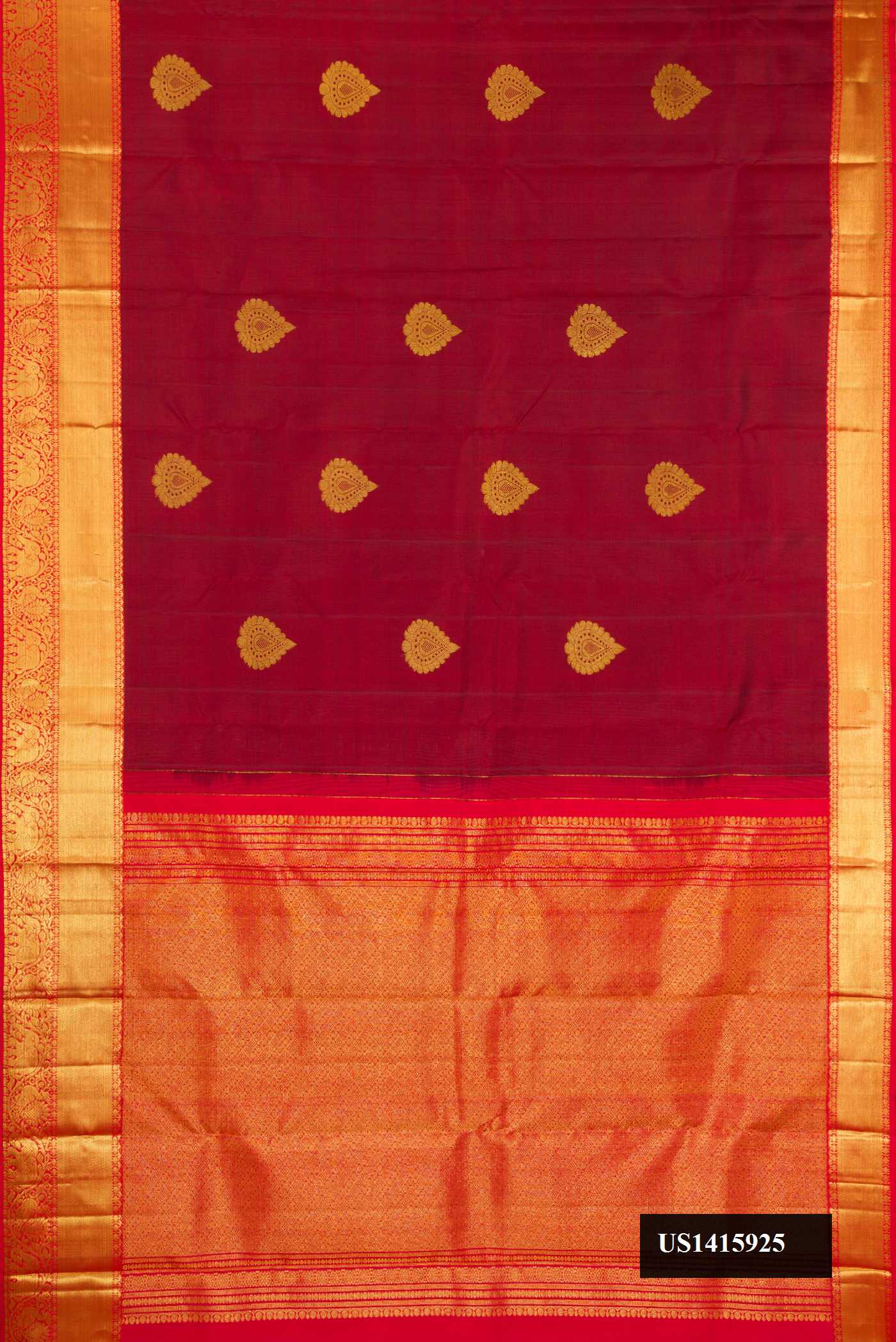 Maroon Dual Tone Kanchipuram Silk Saree with Zari Butta on the body and Zari Border.  displayed on a mannequin