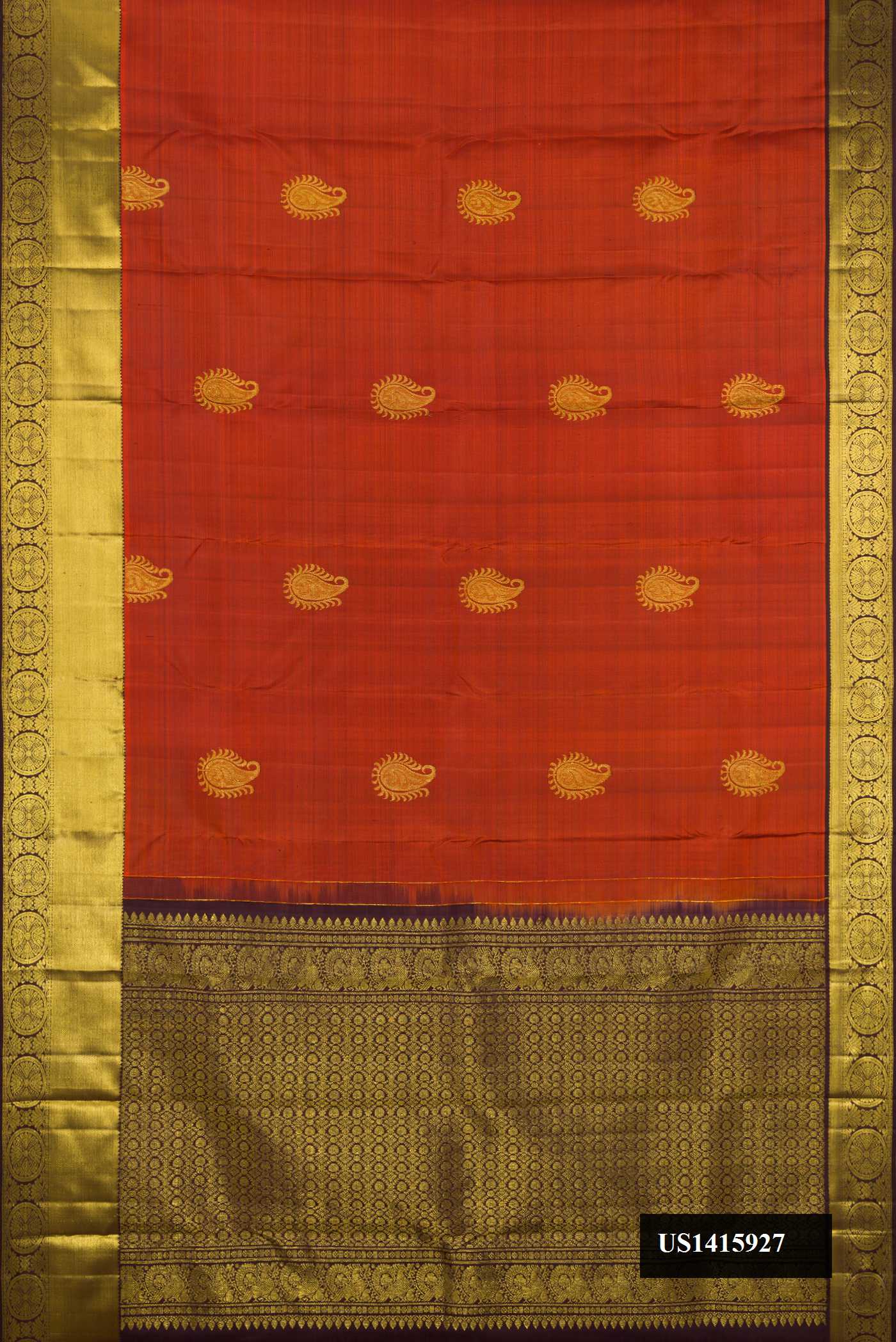 Brick Orange Dual Tone Kanchipuram Silk Saree with Zari Butta on the body and Zari Border.  displayed on a mannequin