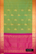 Parrot Green Dual Tone Kanchipuram Silk Saree with Zari Butta on the body and Zari Border.  displayed on a mannequin