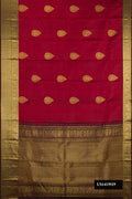 Maroon Dual Tone Kanchipuram Silk Saree with Zari Butta on the body and Zari Border.  displayed on a mannequin