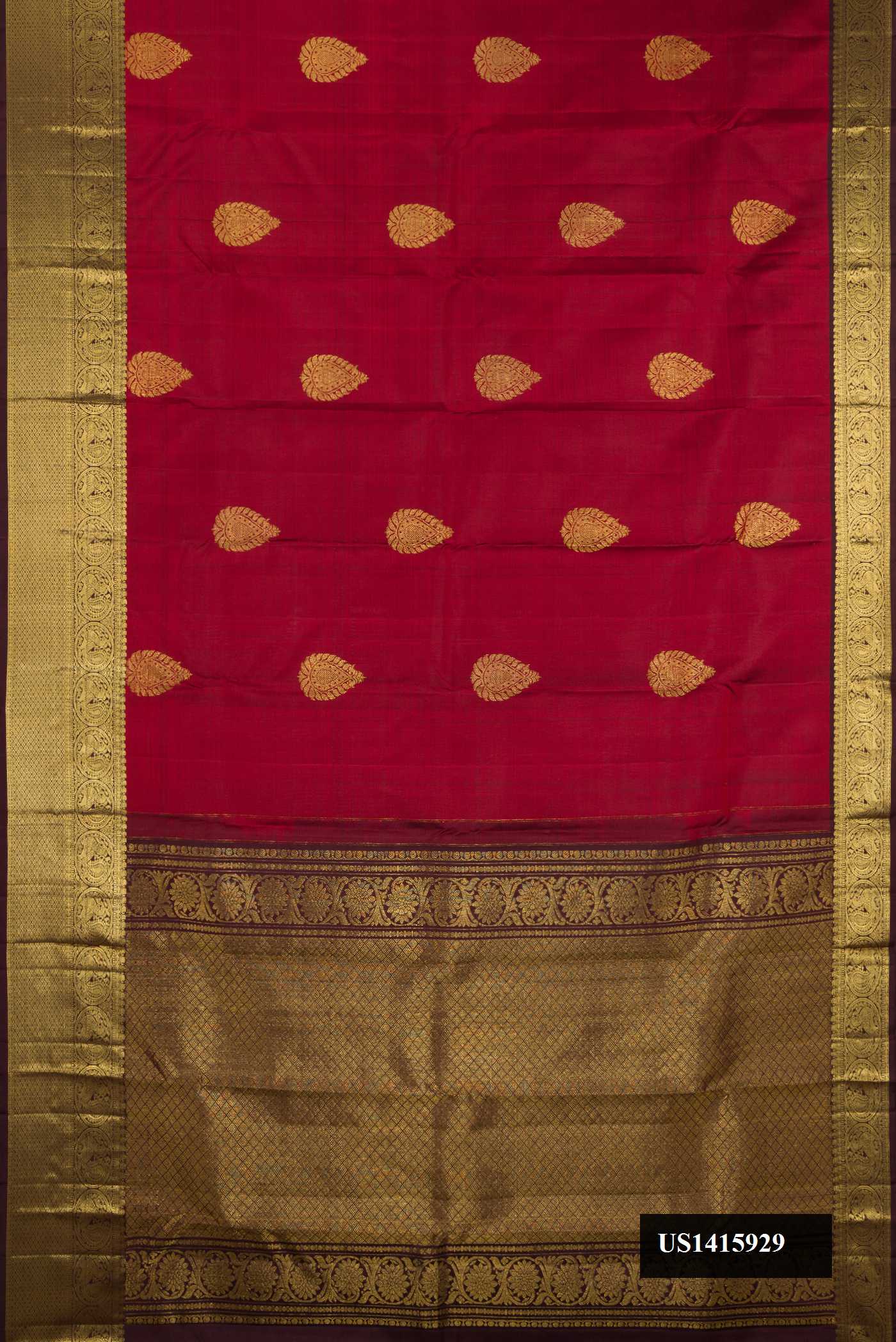Maroon Dual Tone Kanchipuram Silk Saree with Zari Butta on the body and Zari Border.  displayed on a mannequin