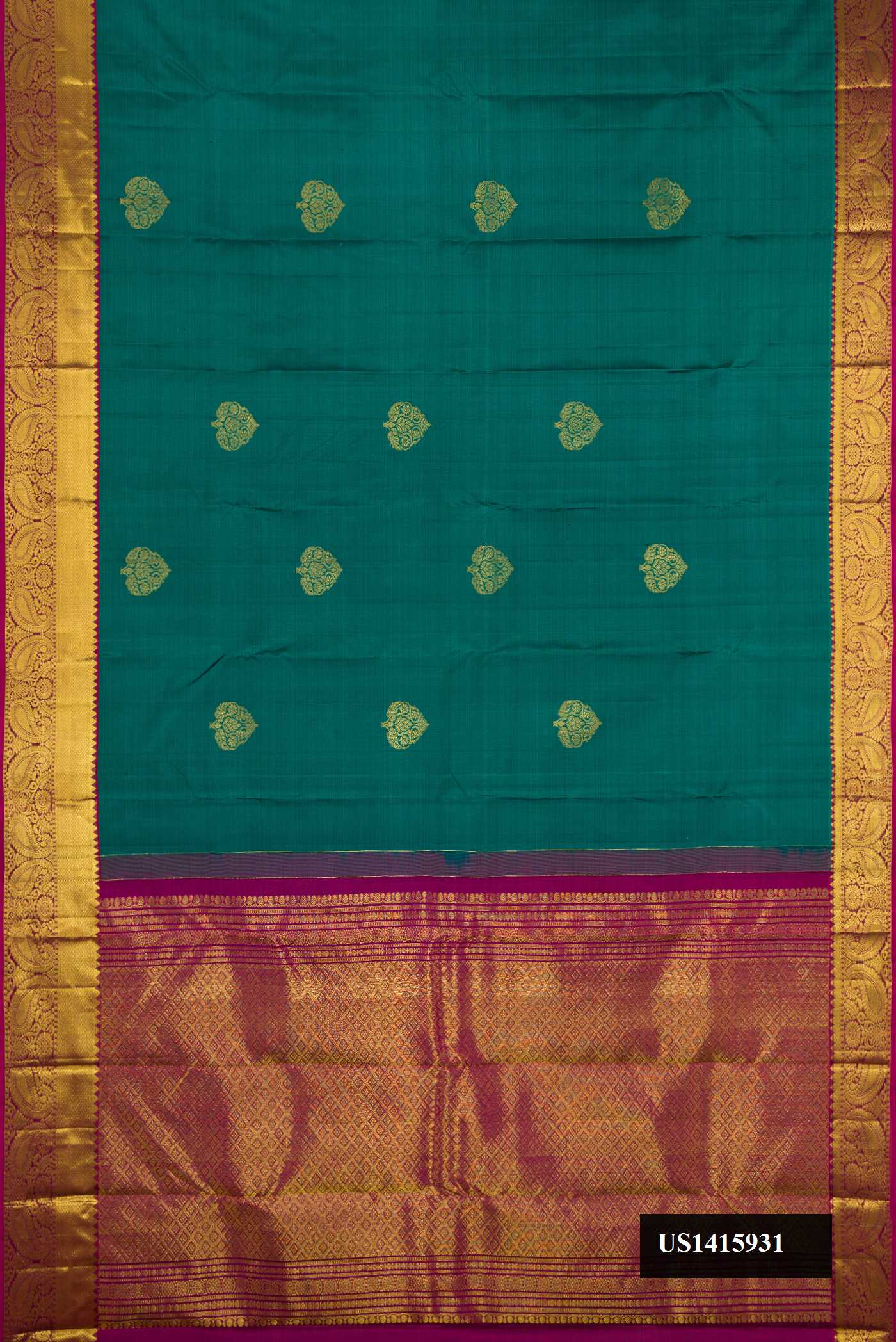 Green Dual Tone Kanchipuram Silk Saree with Zari Butta on the body and Zari Border.  displayed on a mannequin