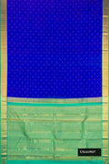 Royal Blue Dual Tone Kanchipuram Silk Saree with Zari Butta on the body and Zari Border.  displayed on a mannequin