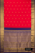 Red Dual Tone Kanchipuram Silk Saree with Zari Butta on the body and Zari Border.  displayed on a mannequin