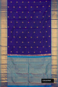Navy Blue Dual Tone Kanchipuram Silk Saree with Zari Butta on the body and Zari Border.  displayed on a mannequin