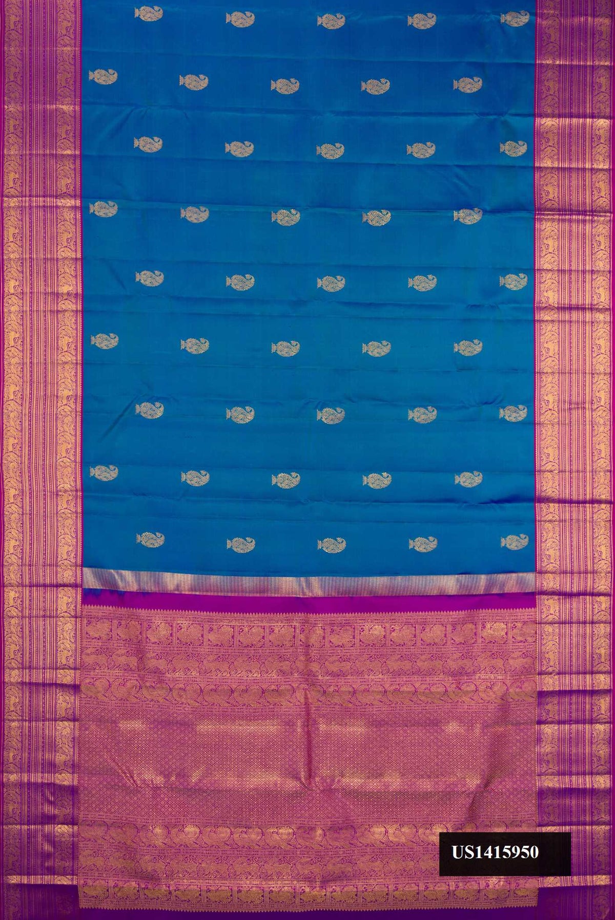 Peacock Blue Dual Tone Kanchipuram Silk Saree with Zari Butta on the body and Zari Border.  displayed on a mannequin