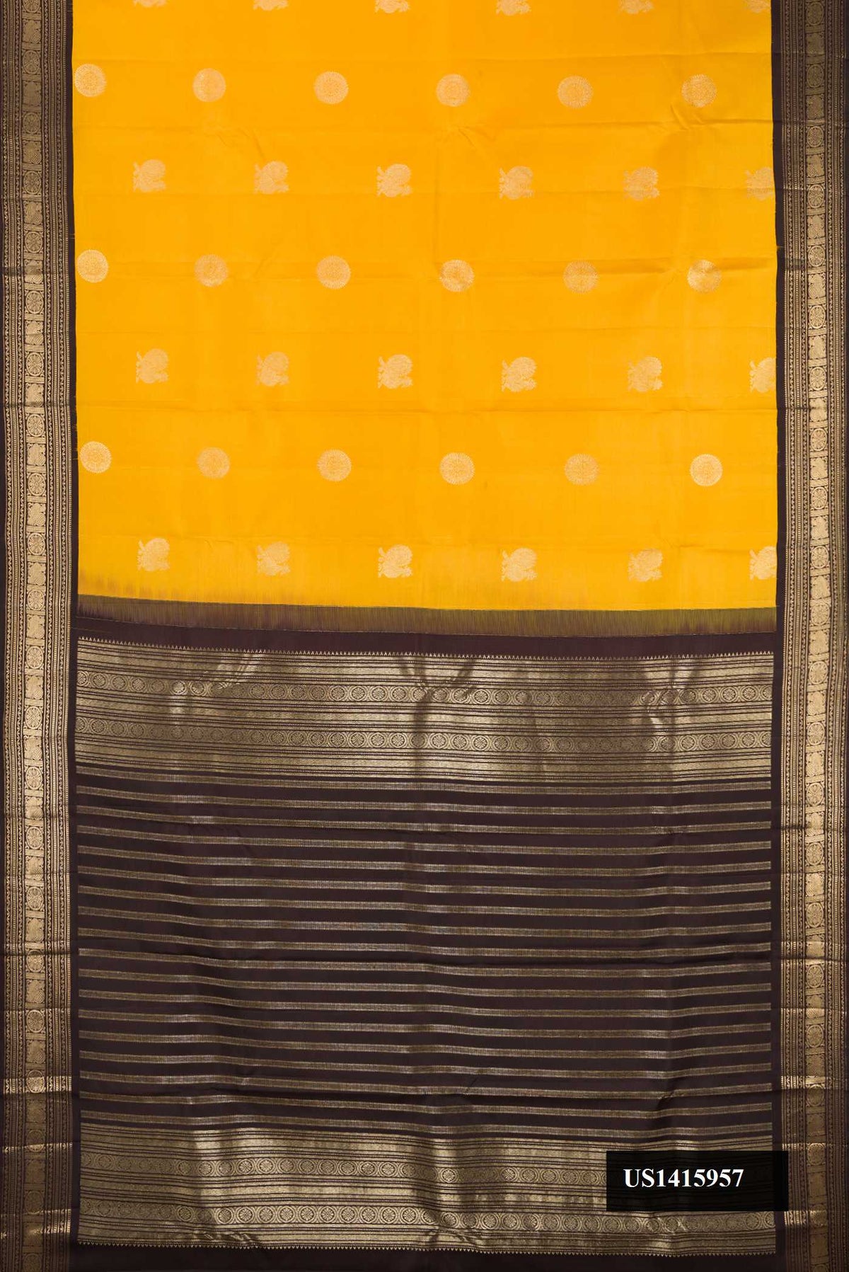 Yellow Dual Tone Kanchipuram Silk Saree with Zari Butta on the body and Zari Border.  displayed on a mannequin