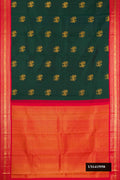 Bottle Green Dual Tone Kanchipuram Silk Saree with Zari Butta on the body and Zari Border.  displayed on a mannequin