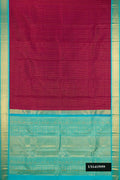 Burgundy Dual Tone Kanchipuram Silk Saree with Checked design on the body and Zari Border.  displayed on a mannequin