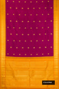 Magenta Dual Tone Kanchipuram Silk Saree with Zari Butta on the body and Zari Border.  displayed on a mannequin