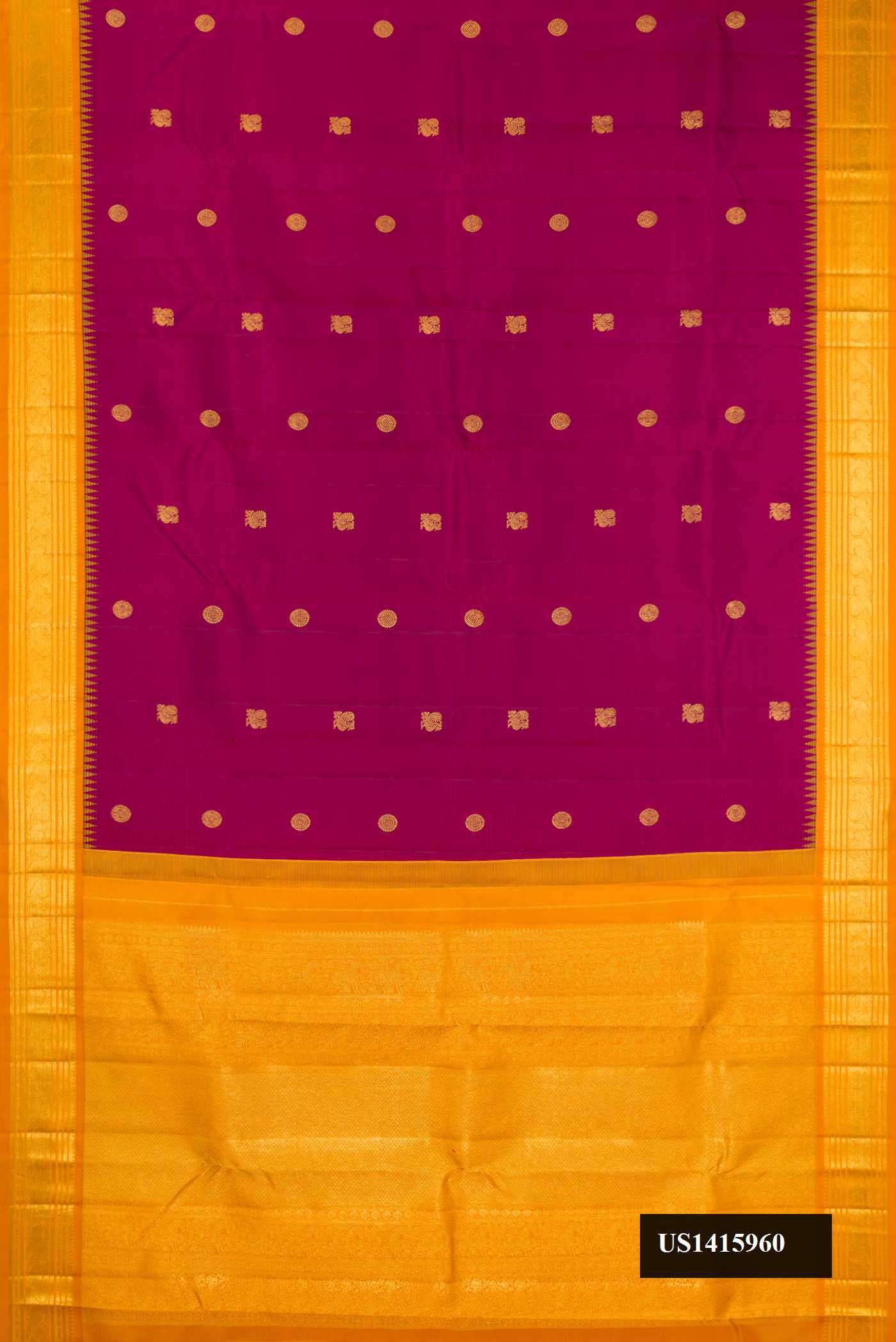 Magenta Dual Tone Kanchipuram Silk Saree with Zari Butta on the body and Zari Border.  displayed on a mannequin