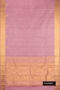 Rose Gold Dual Tone Kanchipuram Silk Saree with Checked design on the body and Zari Border.  displayed on a mannequin