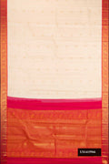 Beige Dual Tone Kanchipuram Silk Saree with Zari Butta on the body and Zari Border.  displayed on a mannequin