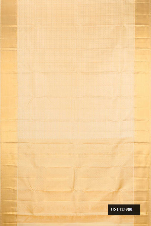 Beige Dual Tone Kanchipuram Silk Saree with Checked design on the body and Zari Border.  displayed on a mannequin