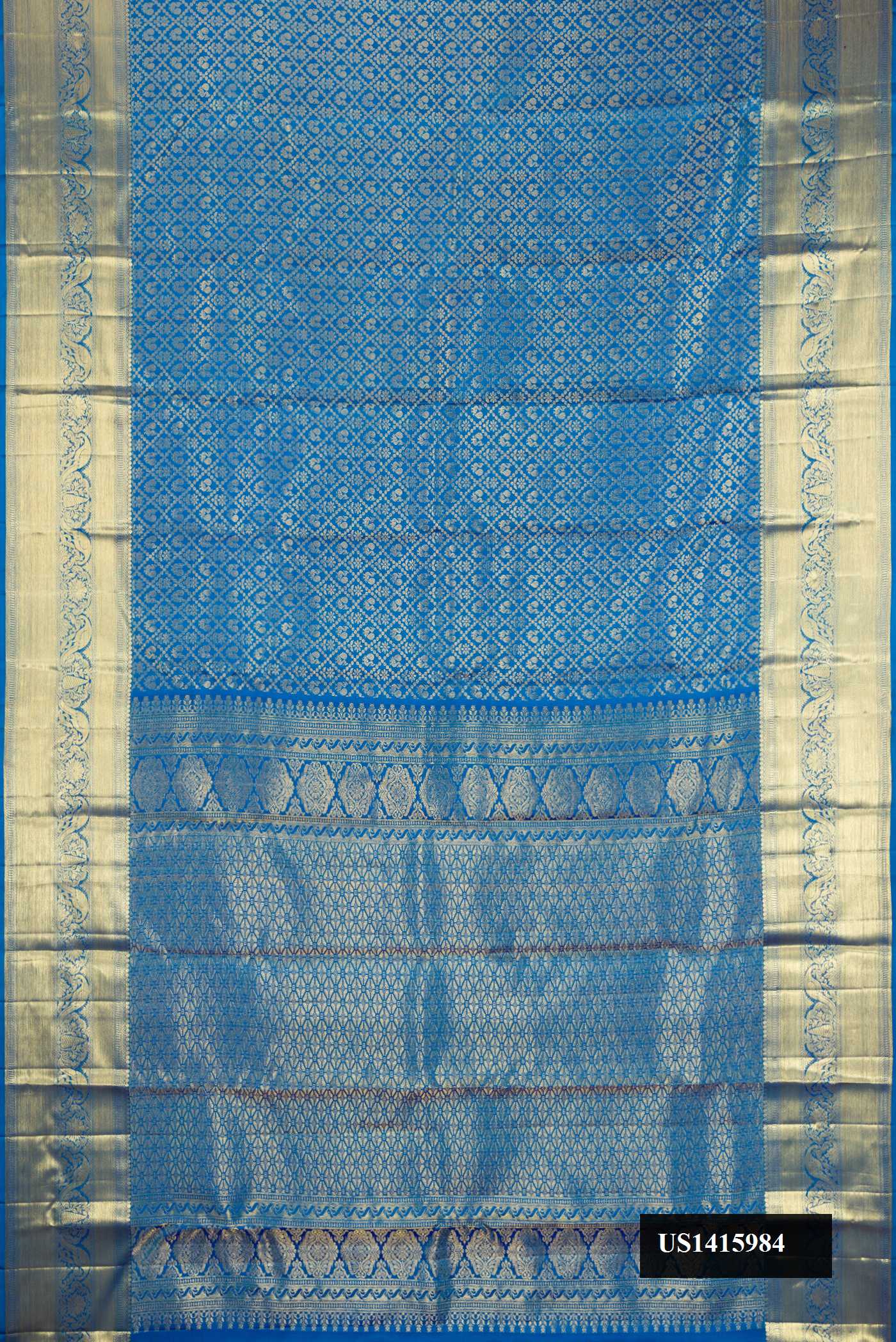 Royal Blue Dual Tone Kanchipuram Silk Saree with Zari Brocade on the body and Fancy Border.  displayed on a mannequin