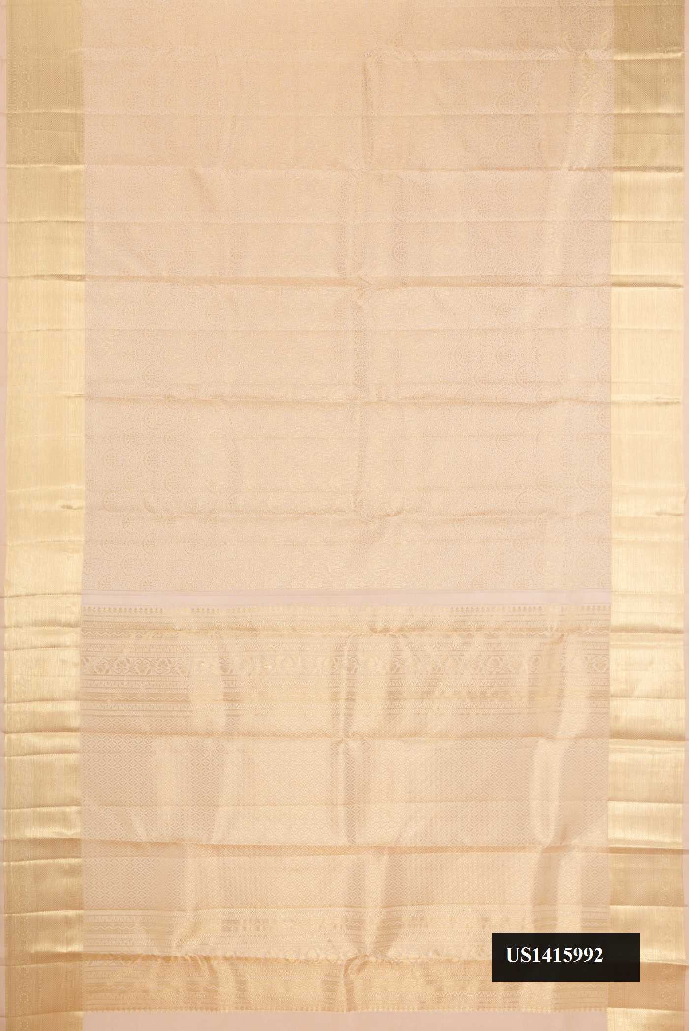 Beige Dual Tone Kanchipuram Silk Saree with Zari Brocade on the body and Zari Border.  displayed on a mannequin