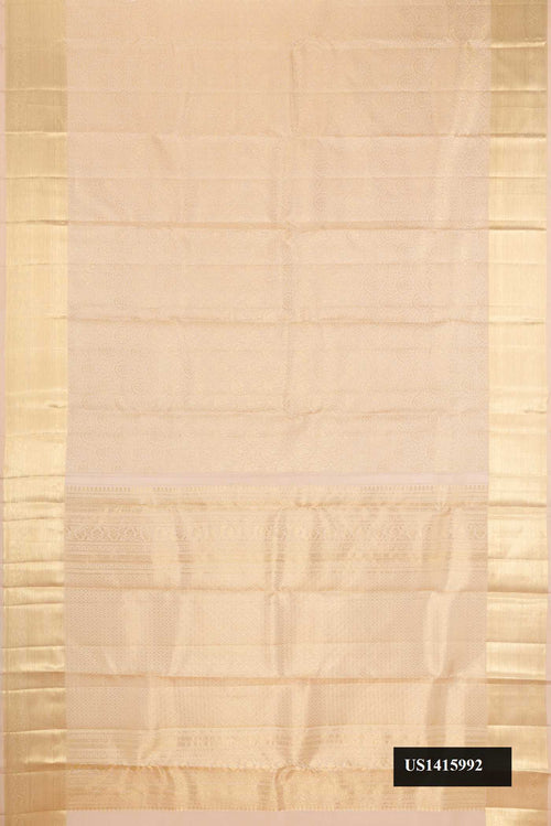 Beige Dual Tone Kanchipuram Silk Saree with Zari Brocade on the body and Zari Border.  displayed on a mannequin